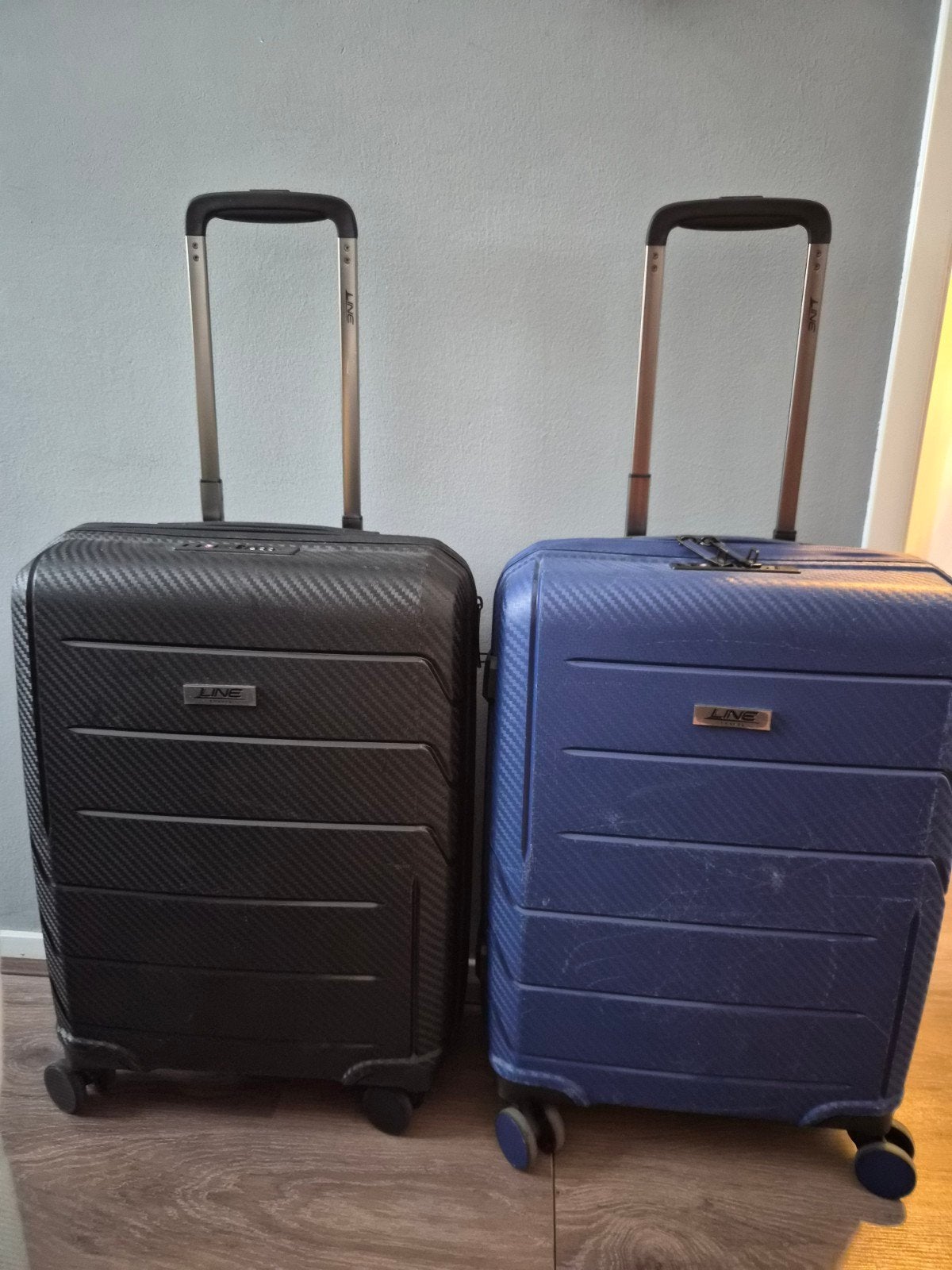 Set van 2 LIV koffers: zwart en blauw, Wieltjes, Gebruikt, 50 tot 60 cm, Hard kunststof