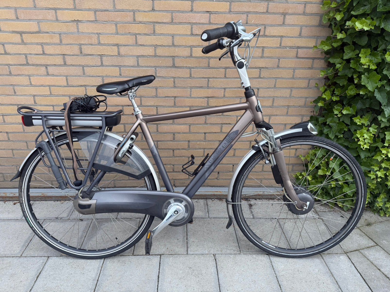 Gazelle 28” elektrische herenfiets, Ophalen, Zo goed als nieuw, 51 tot 55 cm, 50 km per accu of meer