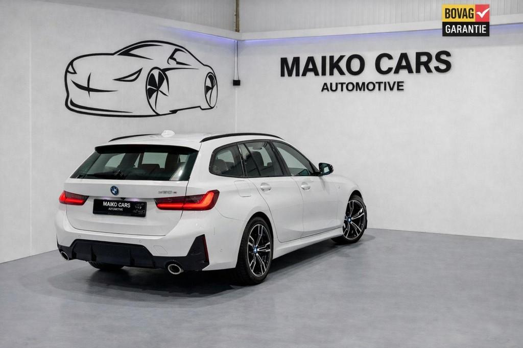 BMW 3-serie Touring 330e M-Performance |Carbon|Pilot Drive, Auto's, BMW, 1998 cc, Gebruikt, Zwart, 4 cilinders