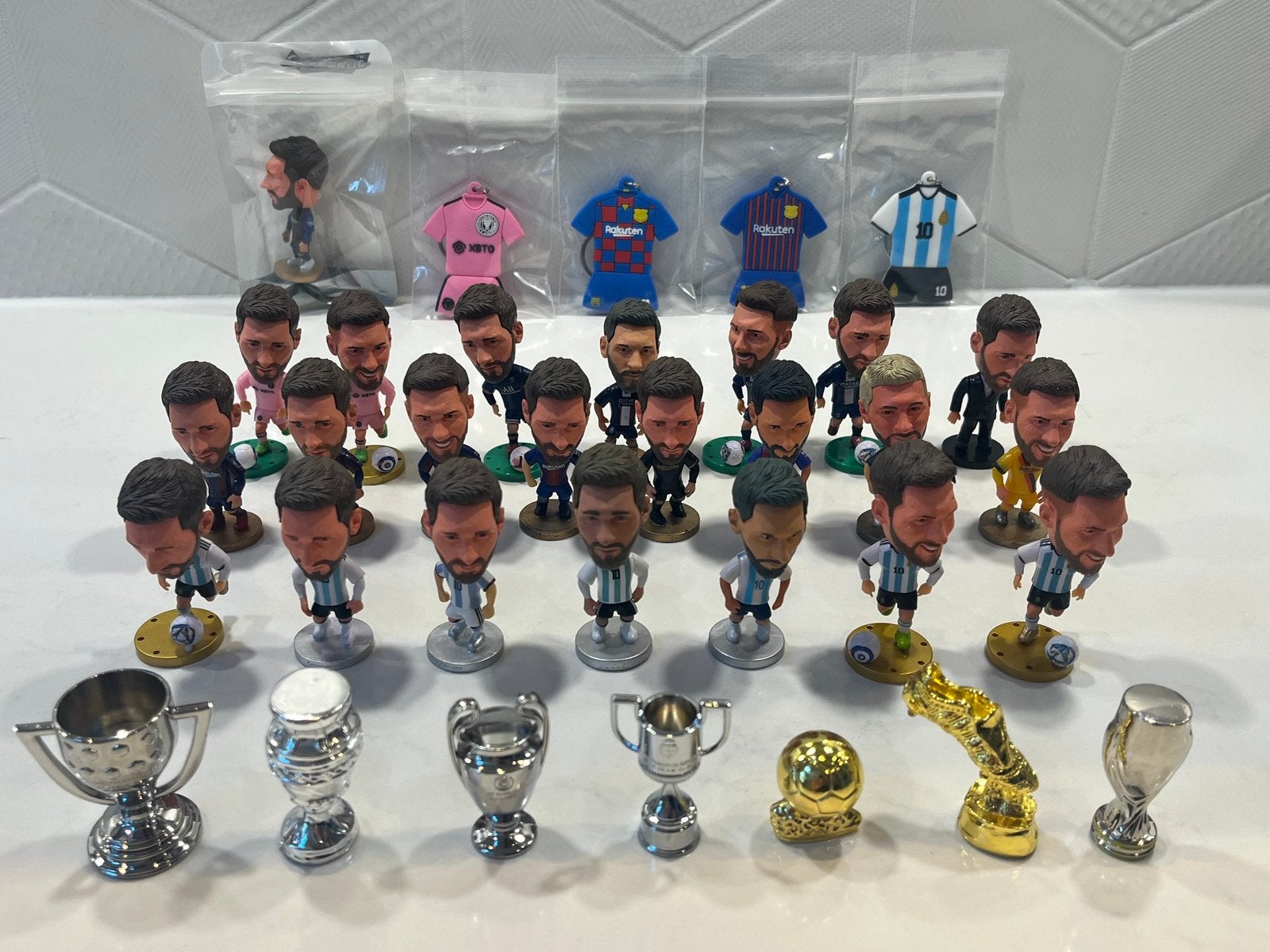Verzameling Lionel Messi voetbalpoppetjes sleuthanger bekers, Verzenden, Zo goed als nieuw, Buitenlandse clubs
