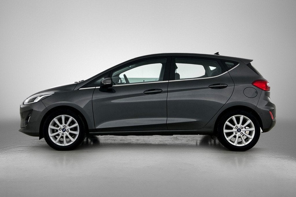 Ford Fiesta 1.0 EcoBoost Titanium (NAVIGATIE, CARPLAY, PARKE, Auto's, Ford, Stof, Gebruikt, 100 pk, 49 €/maand