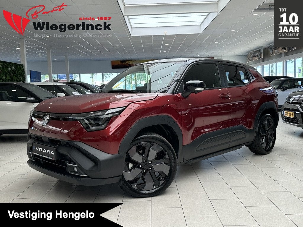 Suzuki e Vitara Style 61 kWh [ 10 JAAR GARANTIE I 360 CAMARA, Auto's, Suzuki, Automaat, 12 maanden, 0 cilinders, Zwart