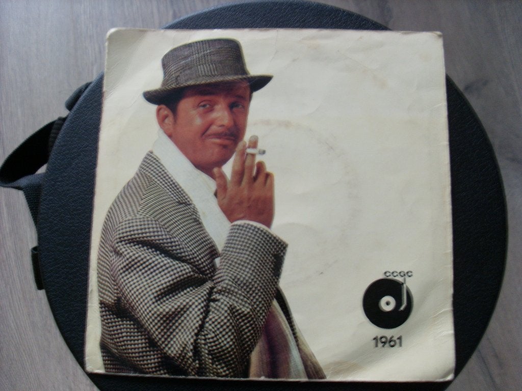 Toon Hermans /Wim Kan - De Slinger van de Koffergrammofoon, Gebruikt, 7 inch, Nederlandstalig, Fotohoes