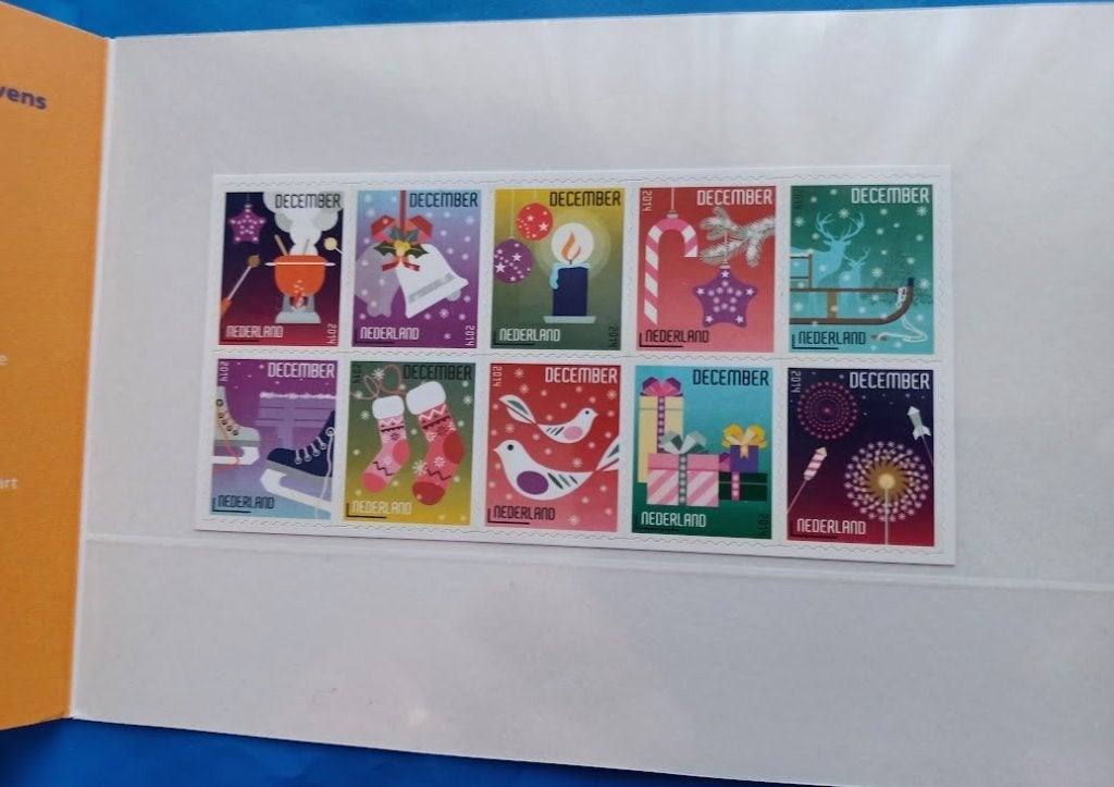 Postzegelmapje 512 A & B - Decemberzegels 2014, Postzegels en Munten, Postzegels | Nederland, Ophalen of Verzenden, Na 1940, Postfris