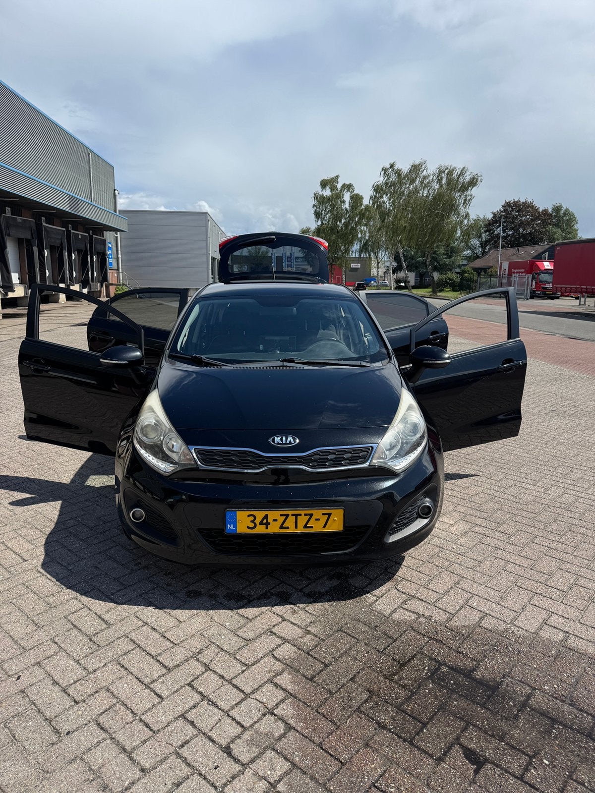 Kia Rio 1.2 I 5DRS 2013 Zwart, 450 kg, 40 €/maand, 4 cilinders, Zwart