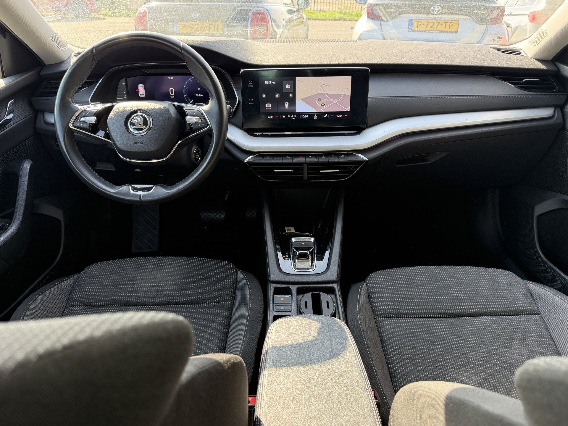 Skoda Octavia Combi 1.0 e-TSI Business Edition Plus  Auto, Auto's, Stof, Gebruikt, Zwart, 1253 kg
