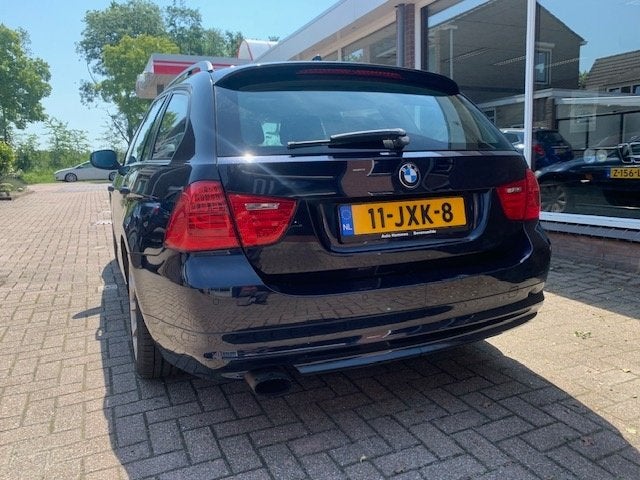 BMW 3-Serie 2.0 318 I Touring 105KW 2009 Blauw, Auto's, BMW, Zwart, Blauw, Parkeersensor, Origineel Nederlands