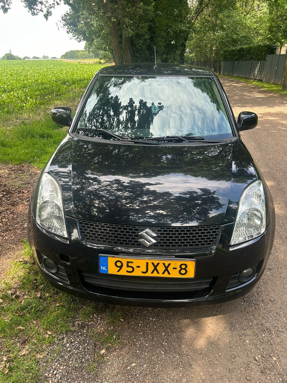 Suzuki Swift 1.3 5D 2009 Zwart, Voorwielaandrijving, 40 €/maand, 400 kg, Origineel Nederlands