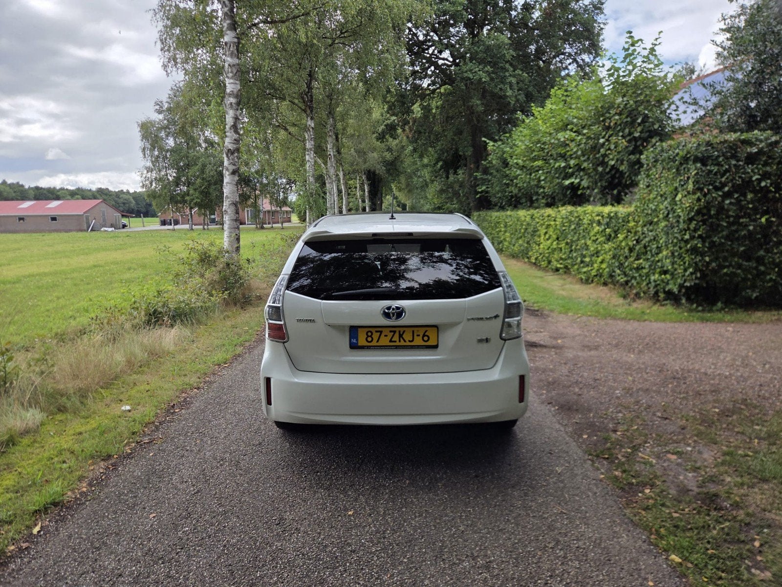 Toyota Prius Wagon 1.8 Full Hybrid 136PK Aut 95g 2013 Wit, Auto's, Zwart, 4 cilinders, Stoelverwarming, 7 stoelen