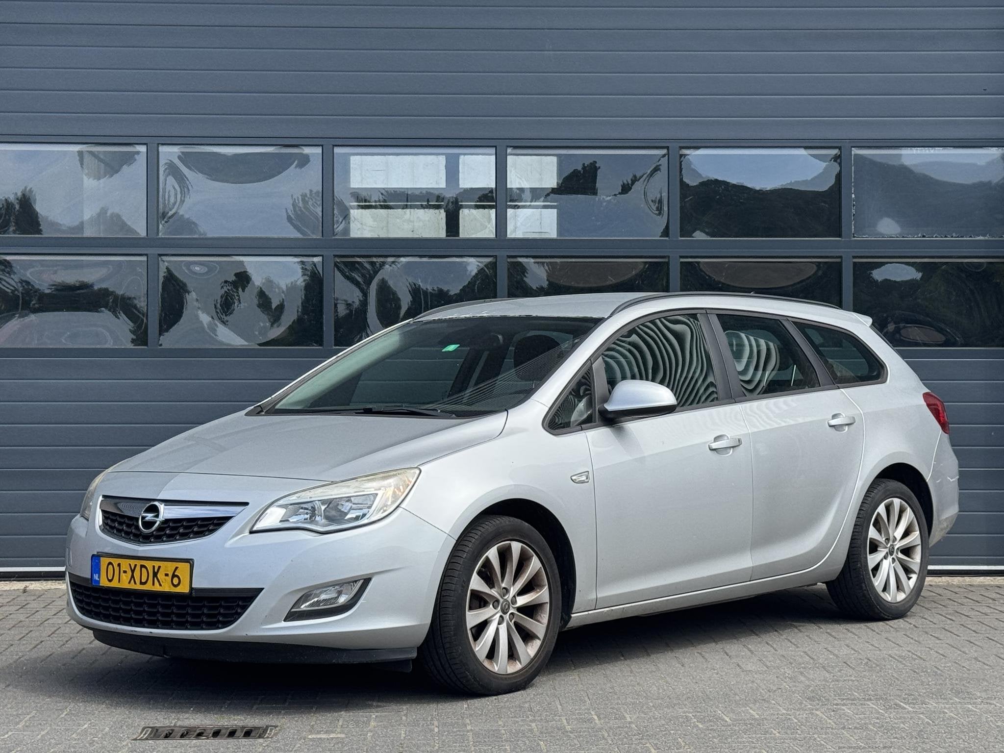 OPEL ASTRA SPORTS TOURER 1.4 ANNIVERSARY EDITION I MEENEEMPR, Auto's, Voorwielaandrijving, Gebruikt, 4 cilinders, Origineel Nederlands