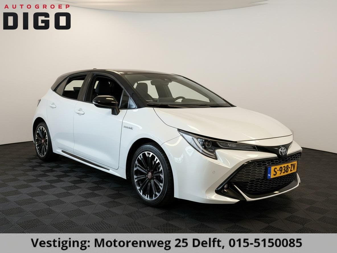 Toyota Corolla 1.8 HYBRID GR-SPORT BI-TONE AUTOMAAT GARANTIE, Auto's, Dealer onderhouden, 450 kg, Gebruikt, 4 cilinders