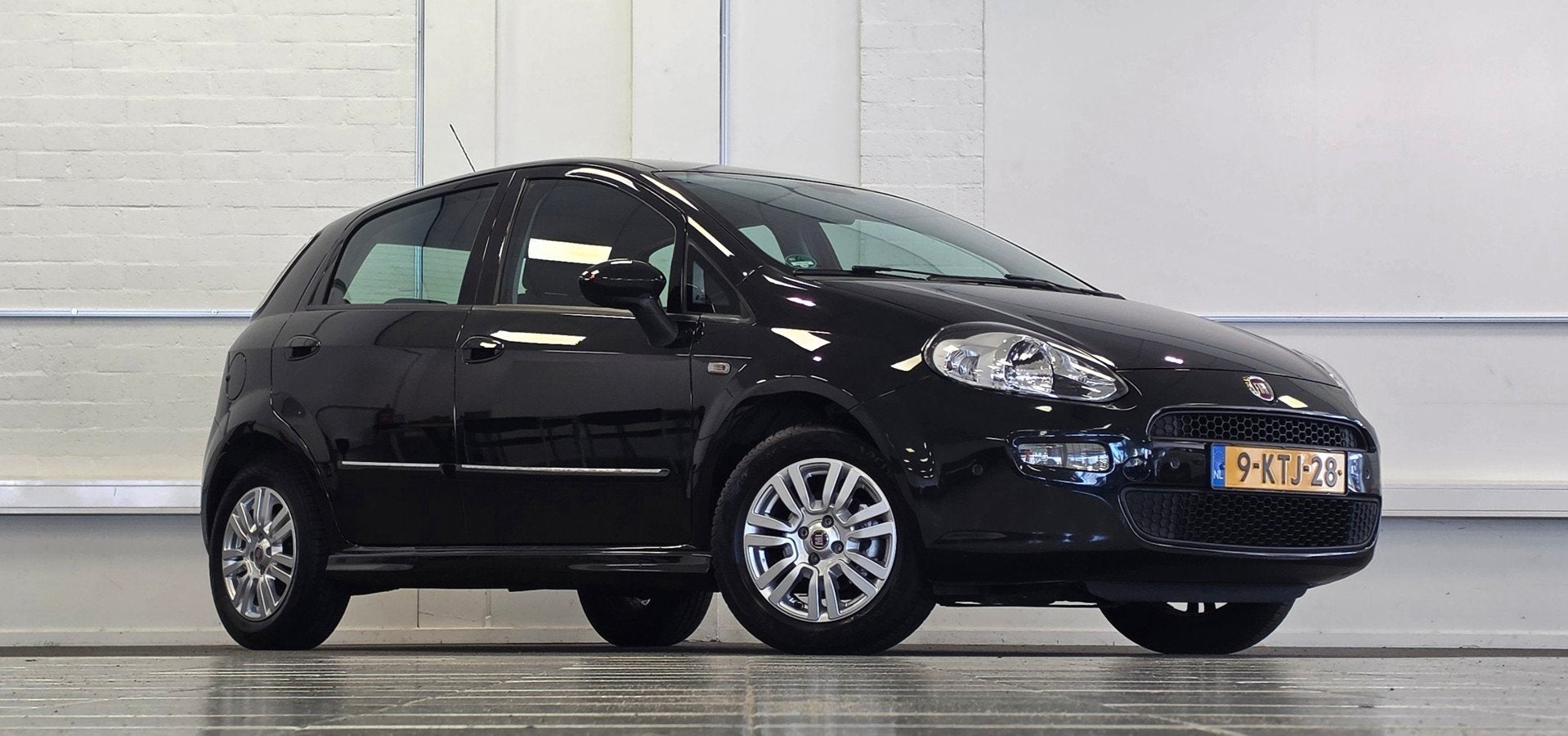 Fiat Punto Evo 1.4 Edizione Cool Automaat 2e Eigenaar Parkee, Auto's, Fiat, Euro 5, Stof, Zwart, 4 cilinders