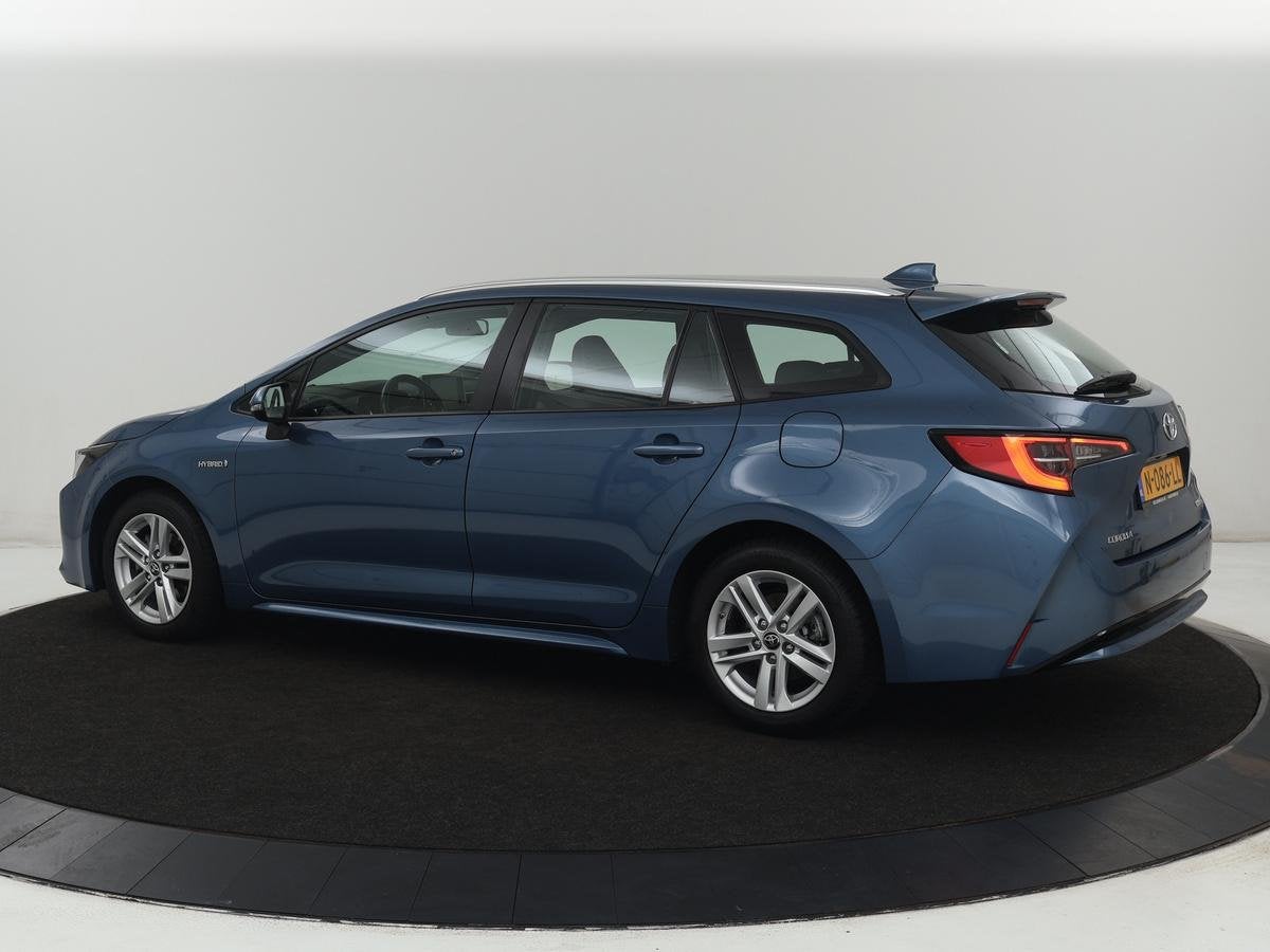 Toyota Corolla Touring Sports 1.8 Hybrid Business | Camera |, Auto's, Toyota, 1345 kg, Gebruikt, 4 cilinders, Blauw