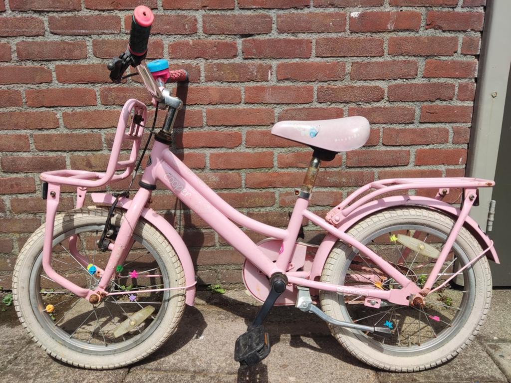 Roze kinderfiets met mandje en bagagedrager, Ophalen