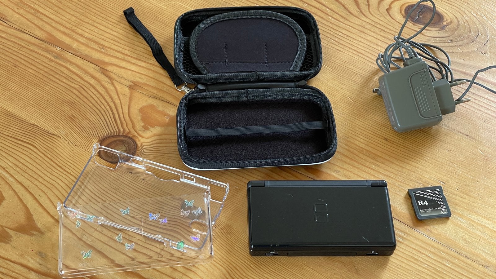 Nintendo DS Lite zwart, met games, Zwart, Ophalen of Verzenden, Zo goed als nieuw, Met beschermhoes of tas