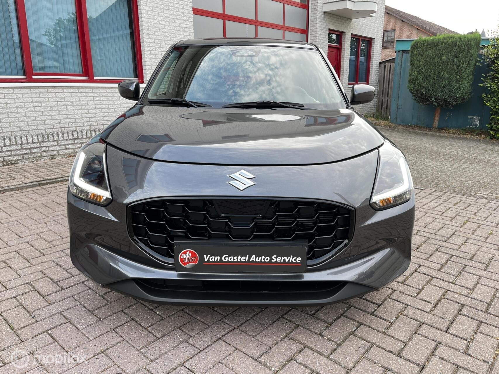 Suzuki Swift 1.2i Smart Hybrid AUTOMAAT/NAVI/CAMERA, Auto's, 83 pk, Stof, Gebruikt, Zwart