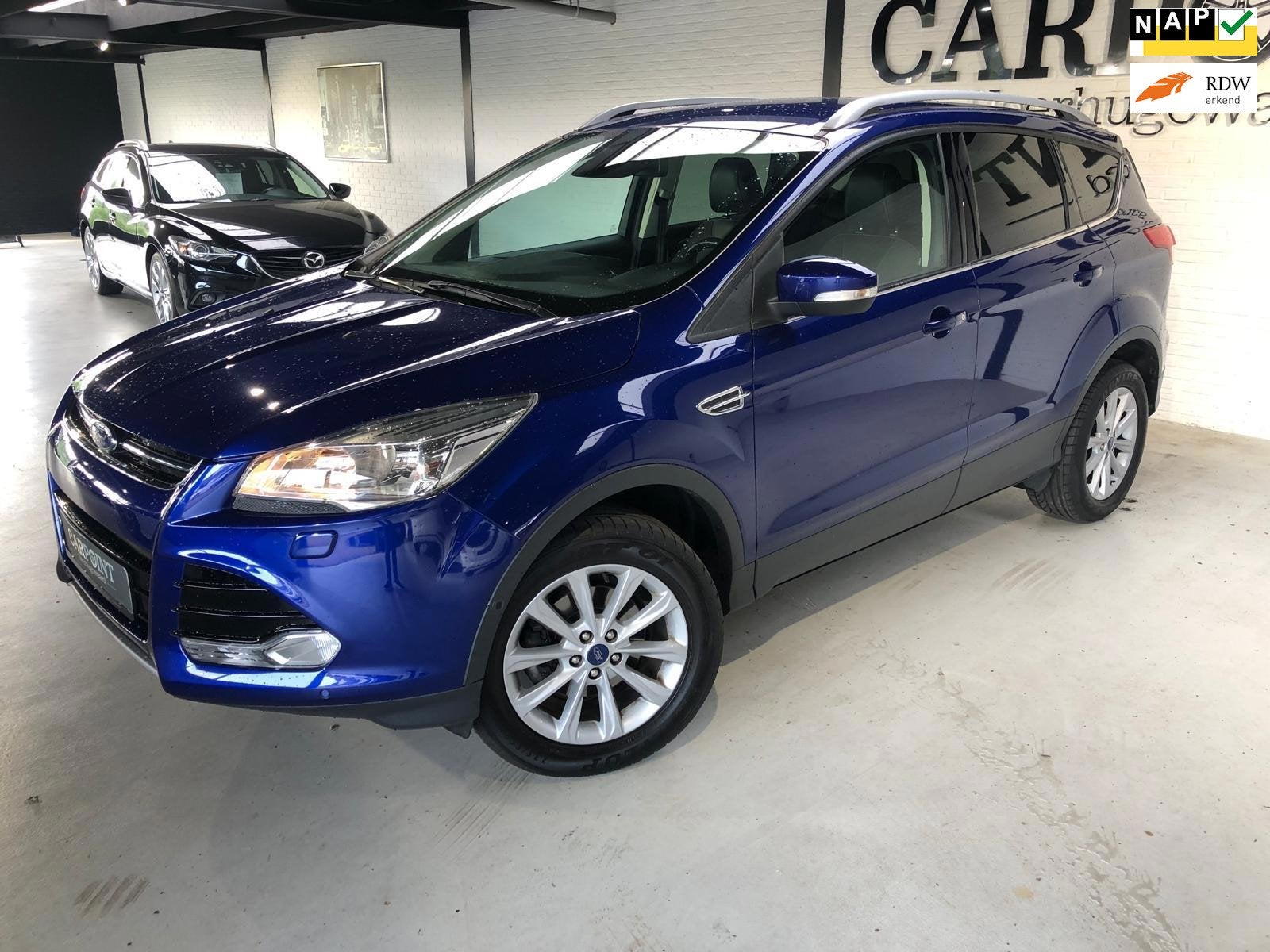 Ford Kuga 1.5 EcoBoost Titanium 150PK 2016 Cruise Clima Navi, Auto's, Ford, 4 cilinders, 150 pk, Blauw, Leder en Stof