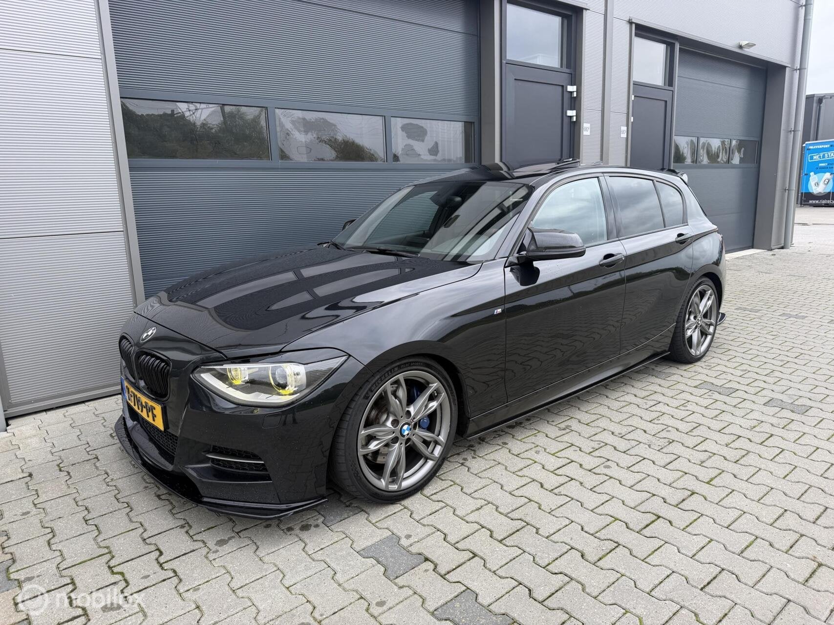 BMW 1-serie M135i xDrive High Executive Stage 2 400PK Dakje, Auto's, Euro 5, Gebruikt, Zwart, 320 pk