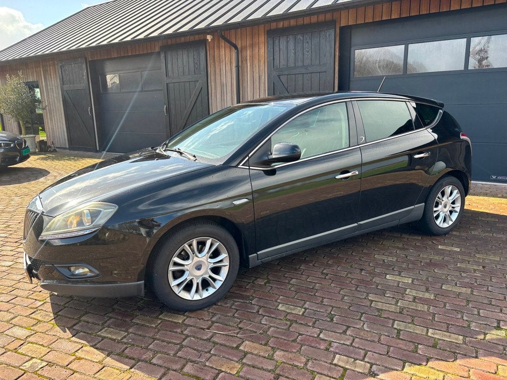 Lancia Delta 1.4-16V Oro, Auto's, Lancia, Voorwielaandrijving, Gebruikt, 4 cilinders, Zwart