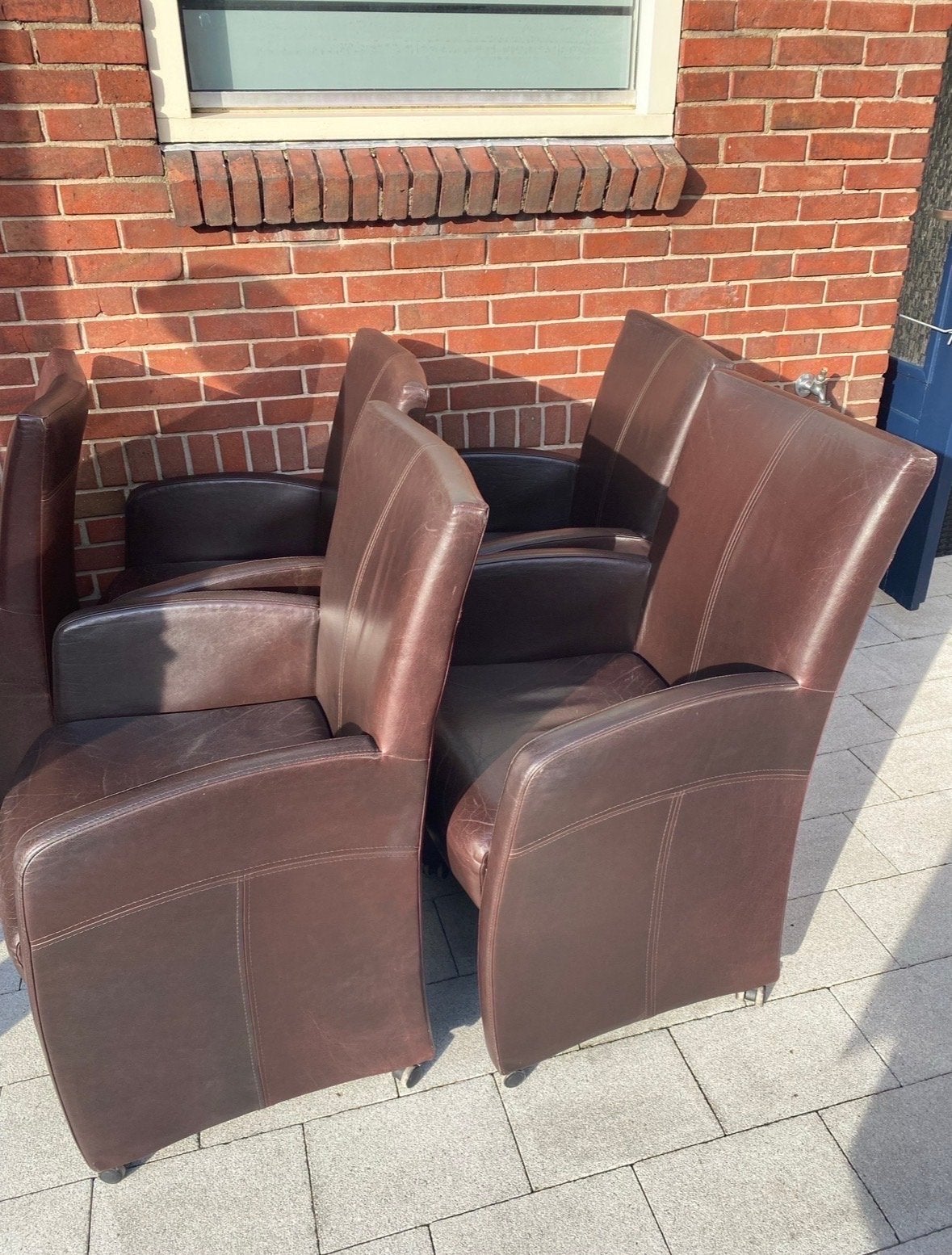 4 Zwarte Leren Eetkamerstoelen op Wieltjes met Relaxstand, Ophalen, Gebruikt, Zwart, Leer
