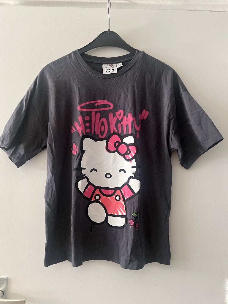 Grijs Hello Kitty shirt maat s, valt als L/Xl, Primark, Maat 42/44 (L), Ophalen of Verzenden, Zo goed als nieuw