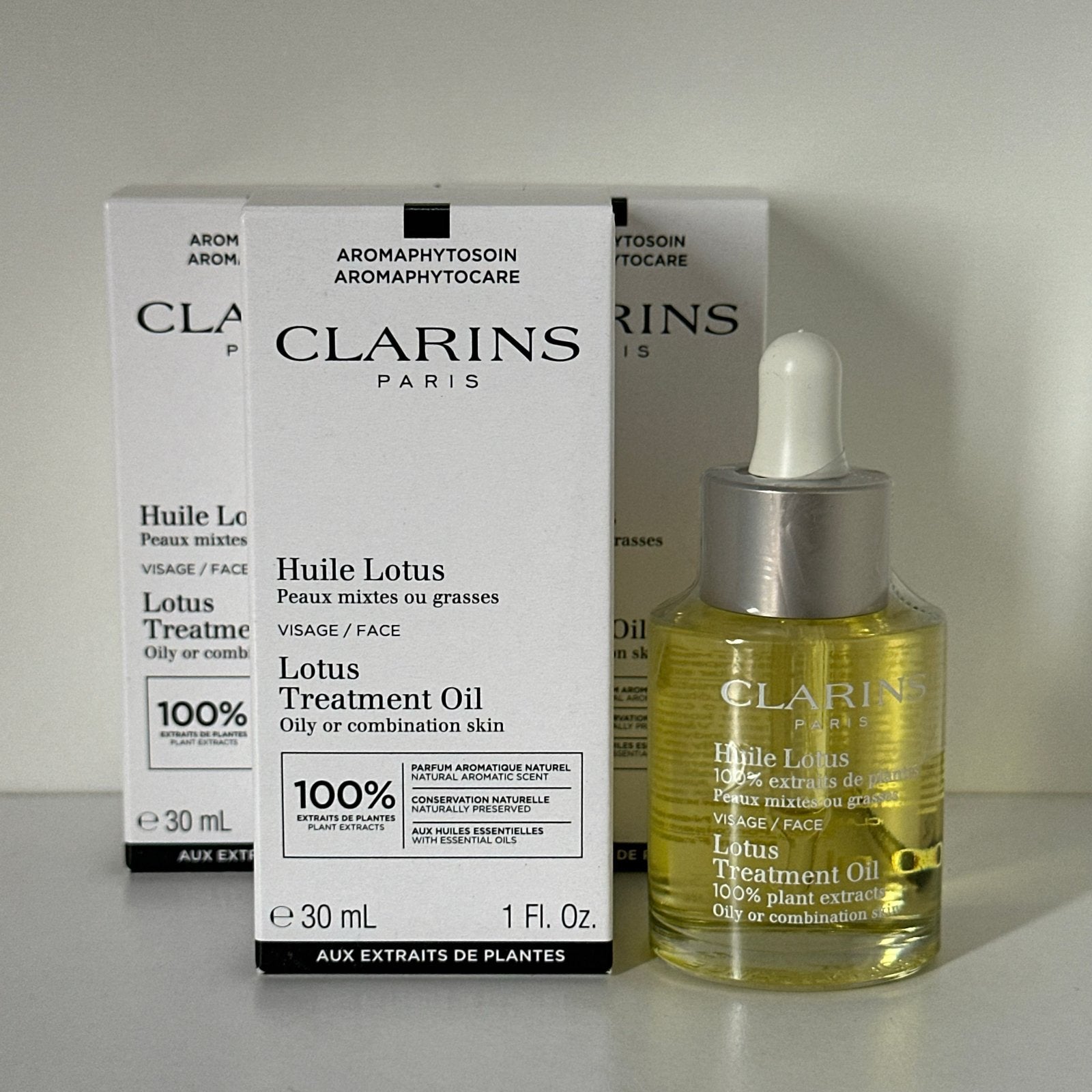 Clarins Lotus Face Treatment Oil 30 ml, Sieraden, Tassen en Uiterlijk, Ophalen of Verzenden, Nieuw, Gehele gezicht, Verzorging