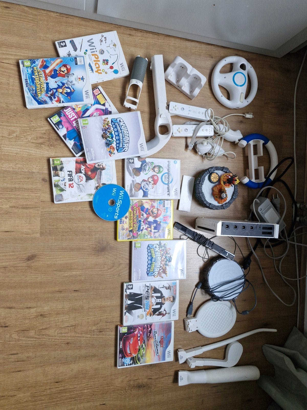 Wii console met veel games en accessoires, Ophalen of Verzenden, Gebruikt, Met 3 controllers of meer, Met stuurtje