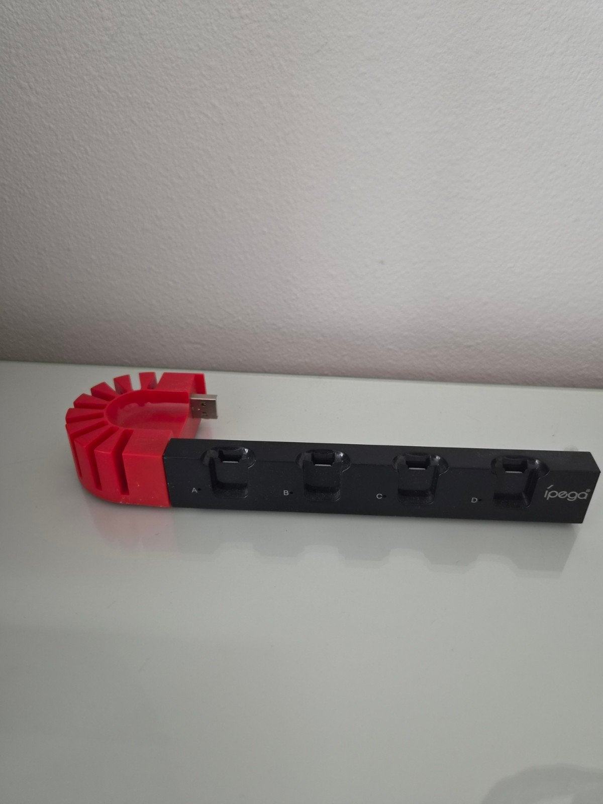 Nintendo Switch oplaadstation en gamehouder, Ophalen of Verzenden, Gebruikt, Switch, Oplader of Kabel