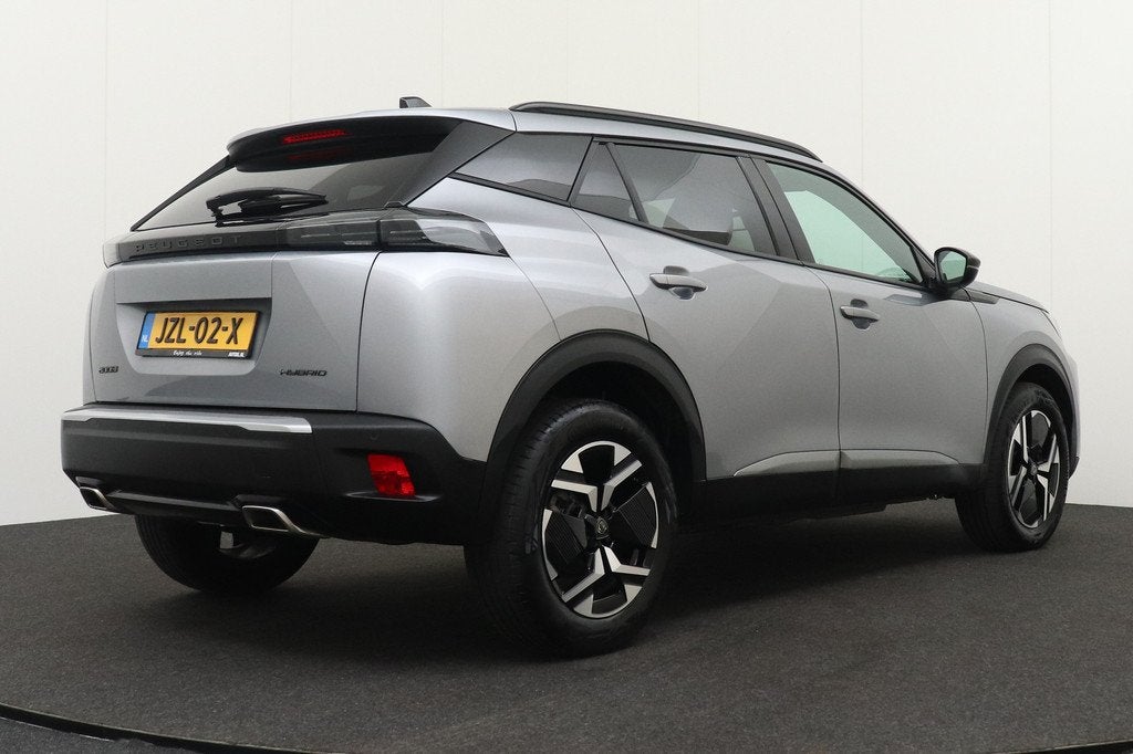 Peugeot 2008 167 PK Aut. Hybrid Allure Half-Leder Climate Ca, Auto's, Peugeot, 1272 kg, Gebruikt, 1199 cc, Leder en Stof