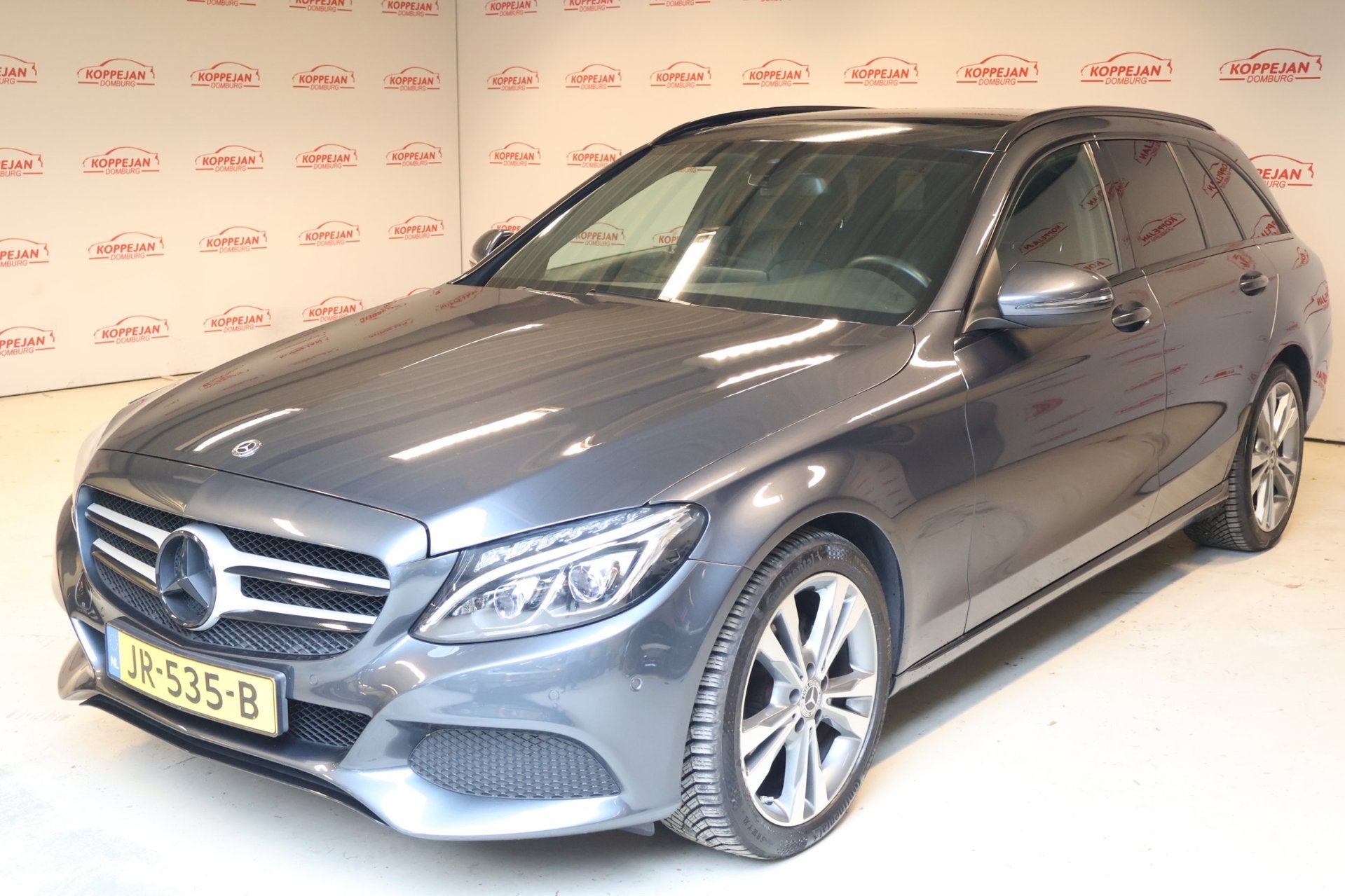 Mercedes-Benz C-klasse Estate 180 Ambition NL Auto|Trekhaak|, Dealer onderhouden, Achterwielaandrijving, Leder en Stof, 750 kg