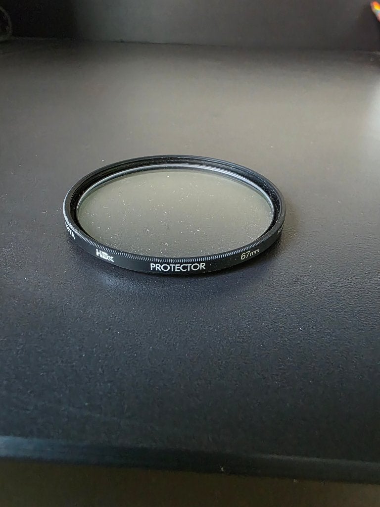 Hoya protector filter 67mm., Ophalen, 60 tot 70 mm, Zo goed als nieuw, Beschermfilter
