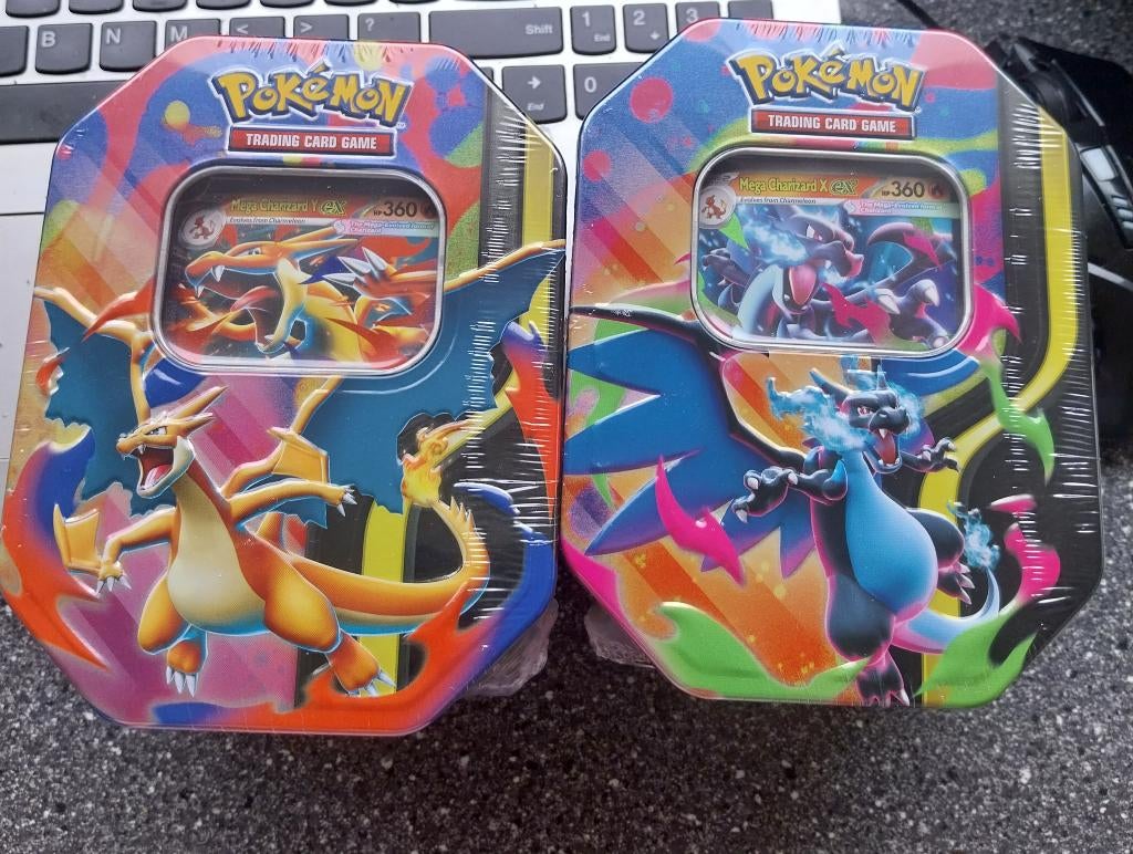 2x Pokemon charizard tin sealed, Ophalen of Verzenden, Nieuw, Boosterbox