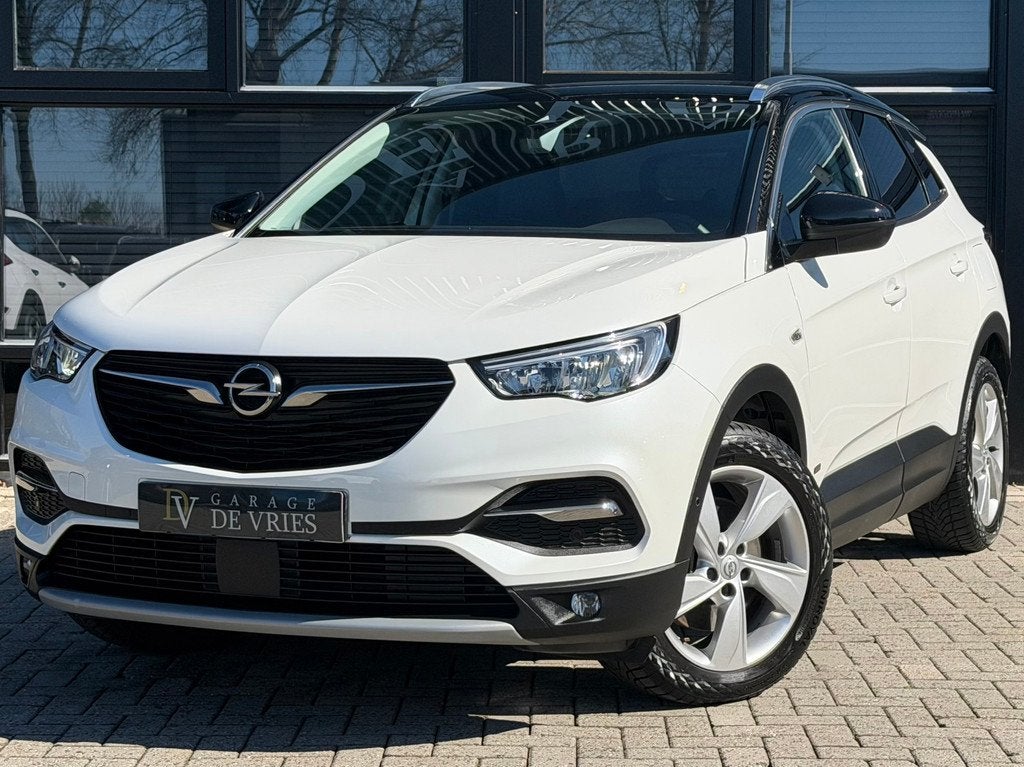 Opel Grandland X 1.6 Turbo Hybrid4 Ultimate 300pk Plug-in Fu, Auto's, Opel, Automaat, 77 km/l, Zwart, 4 cilinders