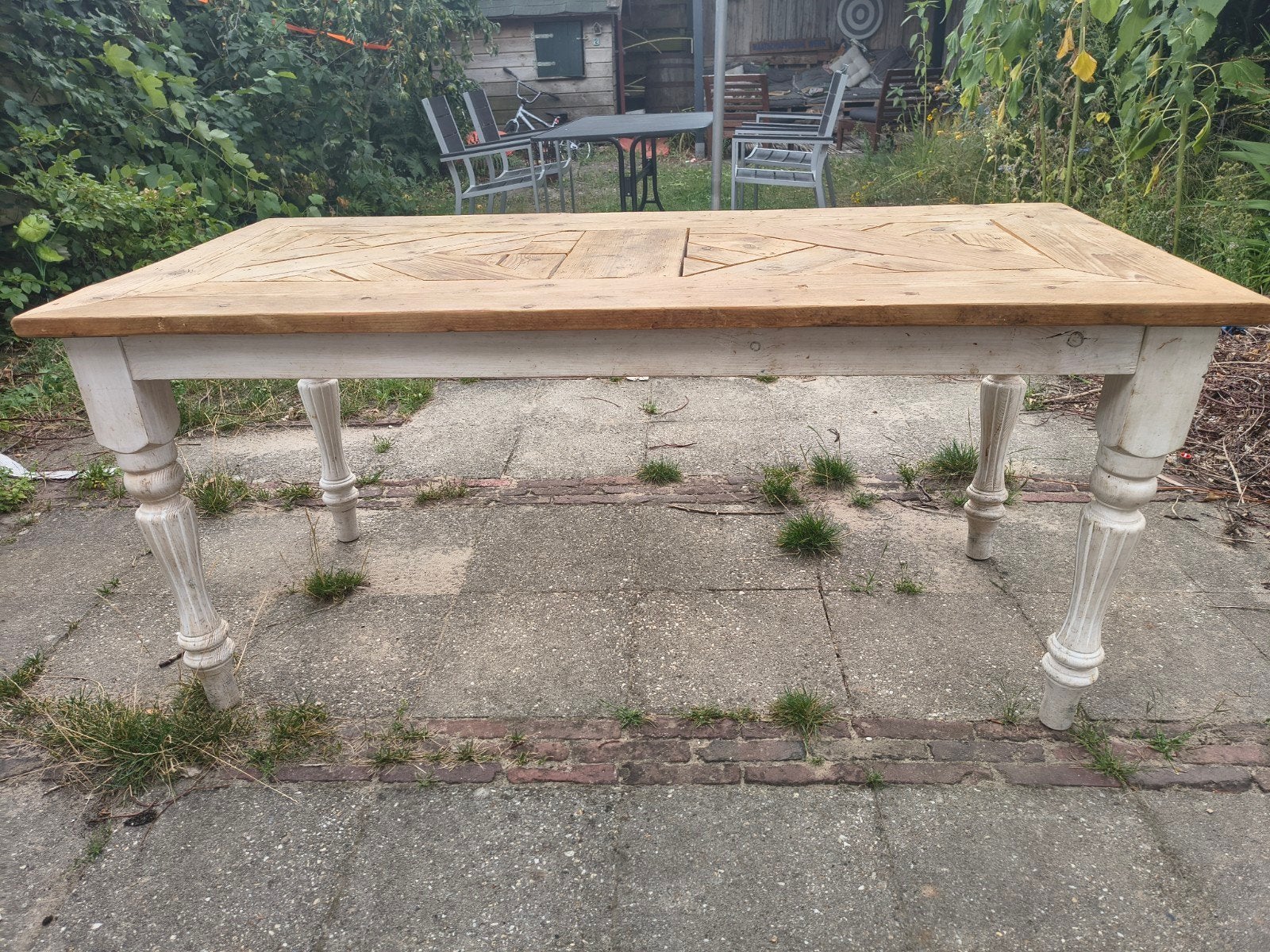Houten eettafel met uniek patroon en gedraaide poten, Ophalen, Gebruikt, 50 tot 100 cm, 150 tot 200 cm