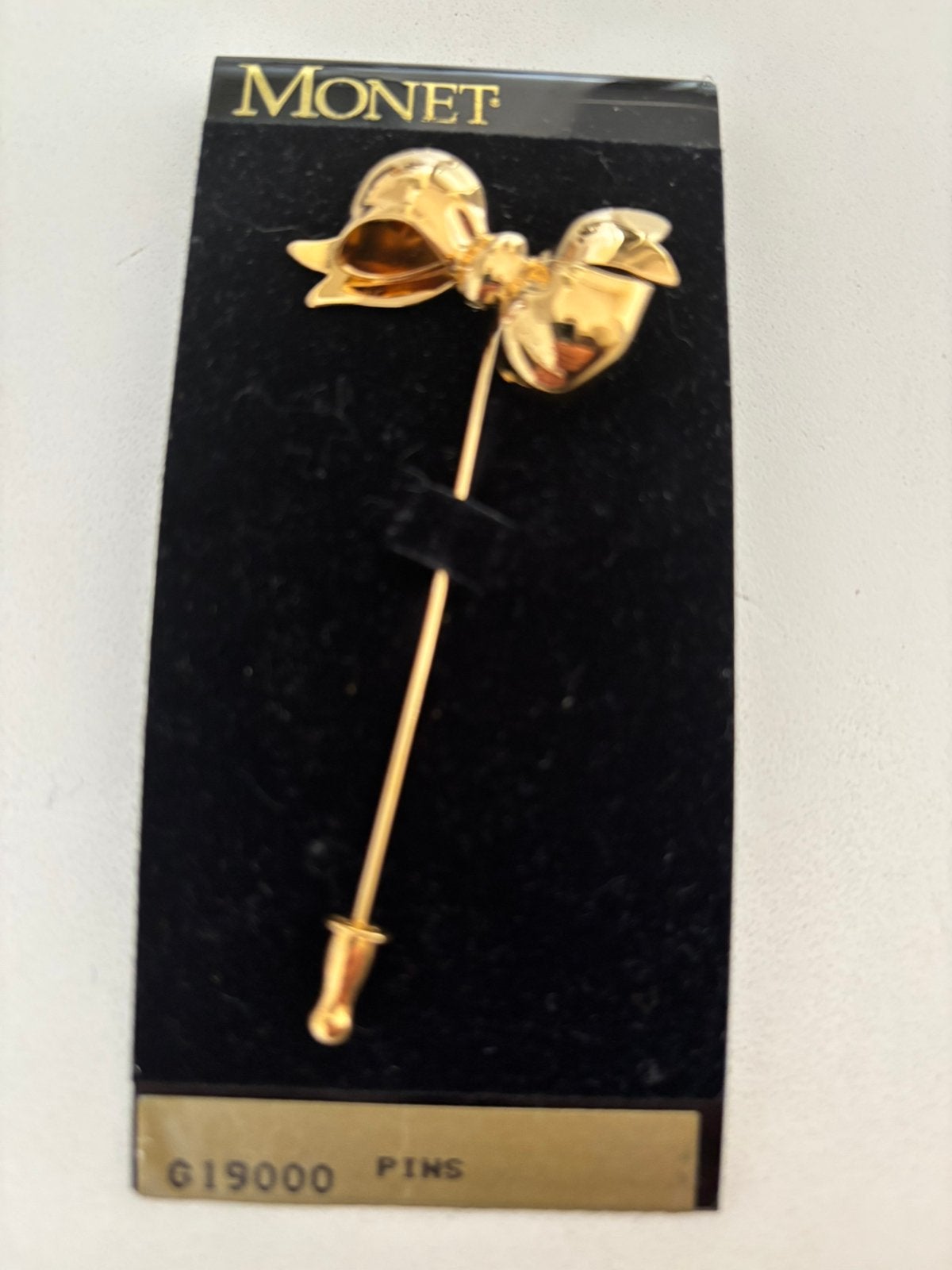 MONET - speld/pin met Strik / NIEUW, Overige materialen, Nieuw, Ophalen of Verzenden, Goud