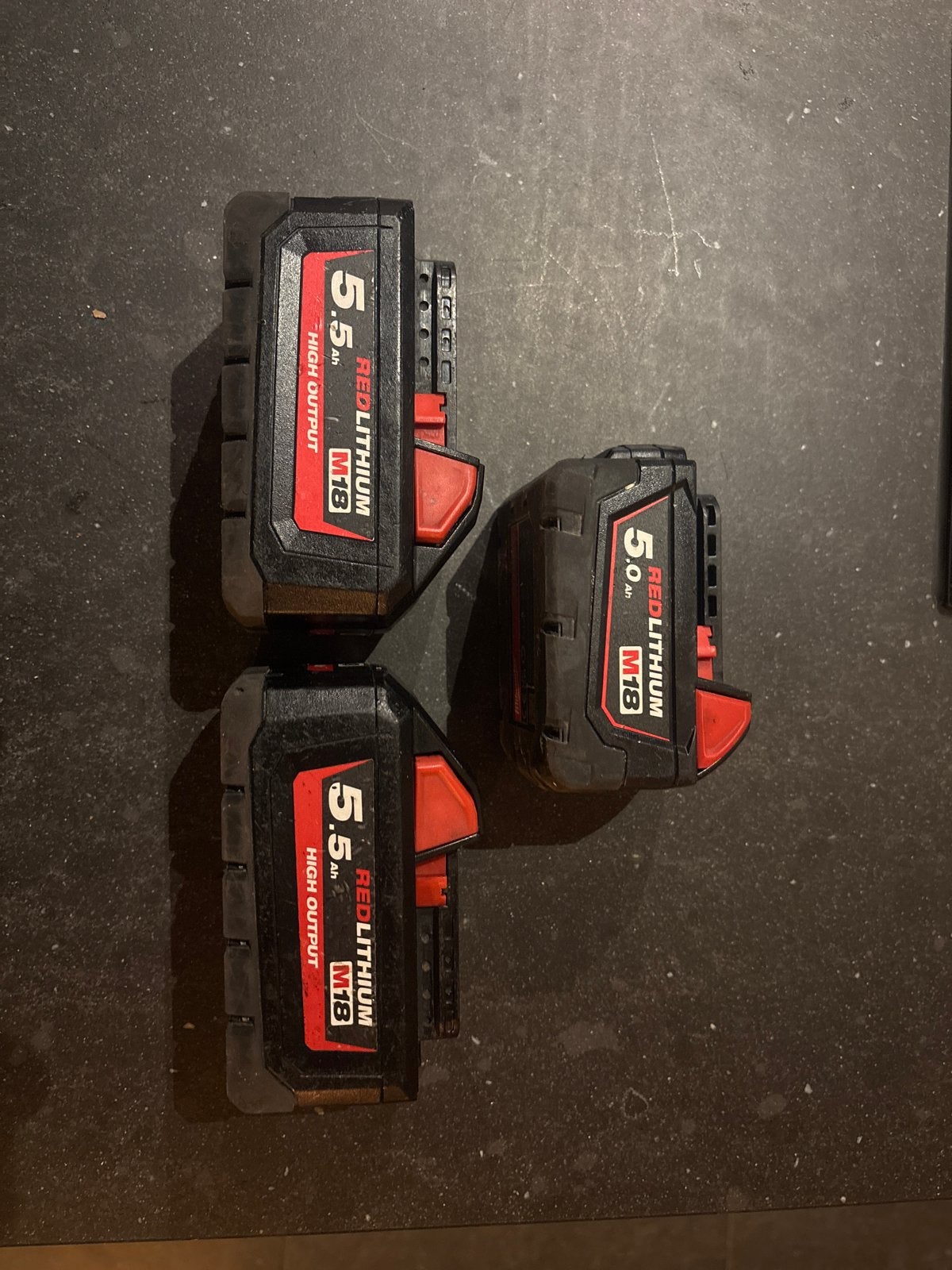 Milwaukee M18 Accu's - 2x 5.5Ah High Output, 1x 5.0Ah, Ophalen of Verzenden, Gebruikt