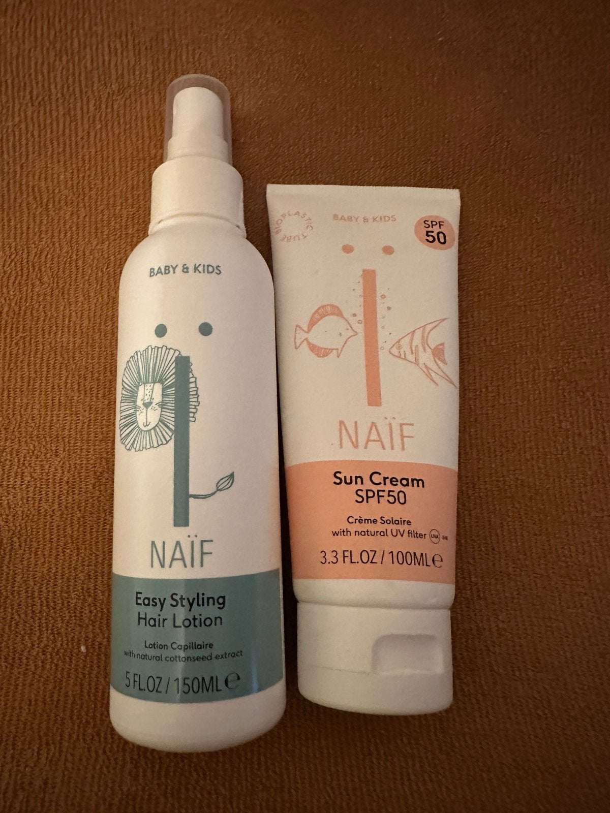 Naif zonnenbrand en haarlotion, Ophalen, Nieuw