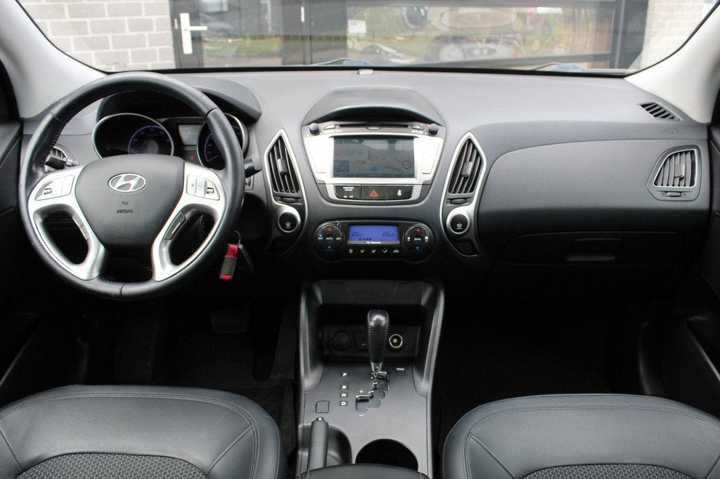 Hyundai ix35 2.0i Style / Automaat / Panoramadak / N.A.P., Auto's, Hyundai, Gebruikt, 4 cilinders, Met garantie (alle), Leder en Stof