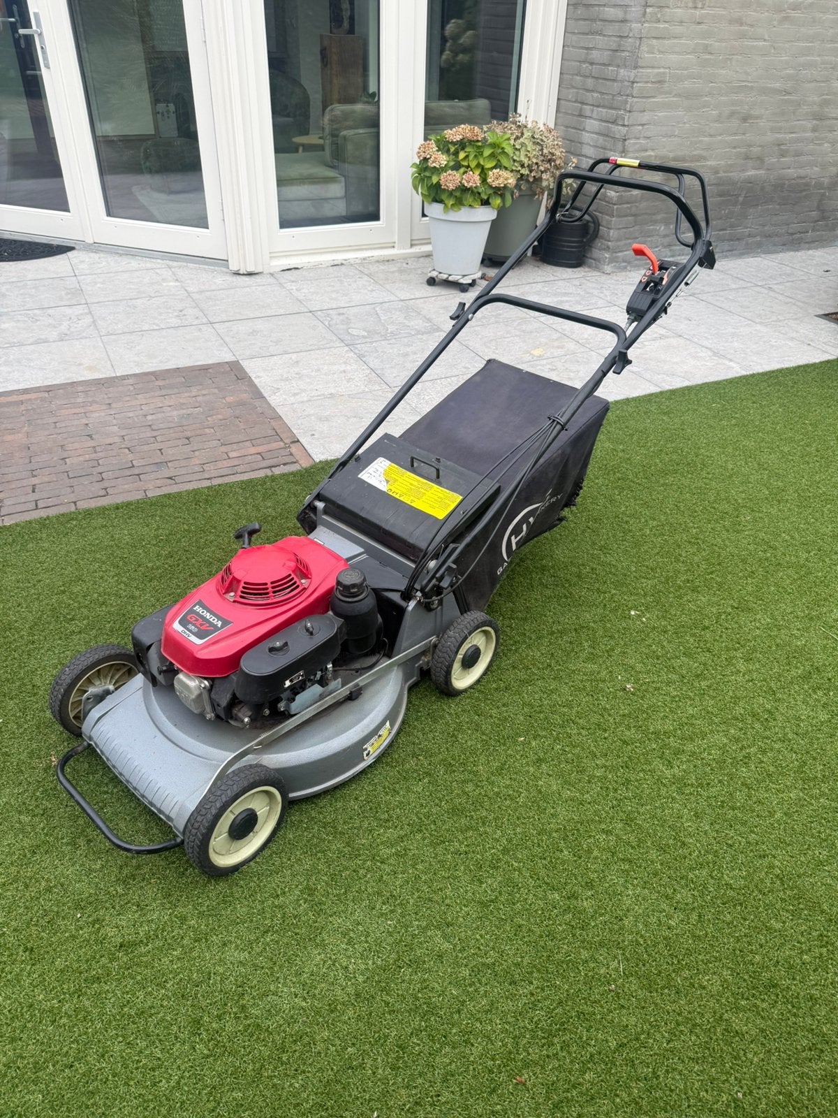 Honda benzine grasmaaier, Tuin en Terras, Ophalen of Verzenden, Zo goed als nieuw, Benzine-grasmaaier, 50 cm of meer