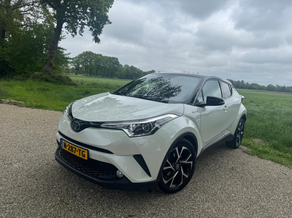 Toyota C-HR 1.8 Hybride 122pk CVT 2018 Wit/Zeer nette auto!, Auto's, Toyota, Stof, 725 kg, 4 cilinders, Wit