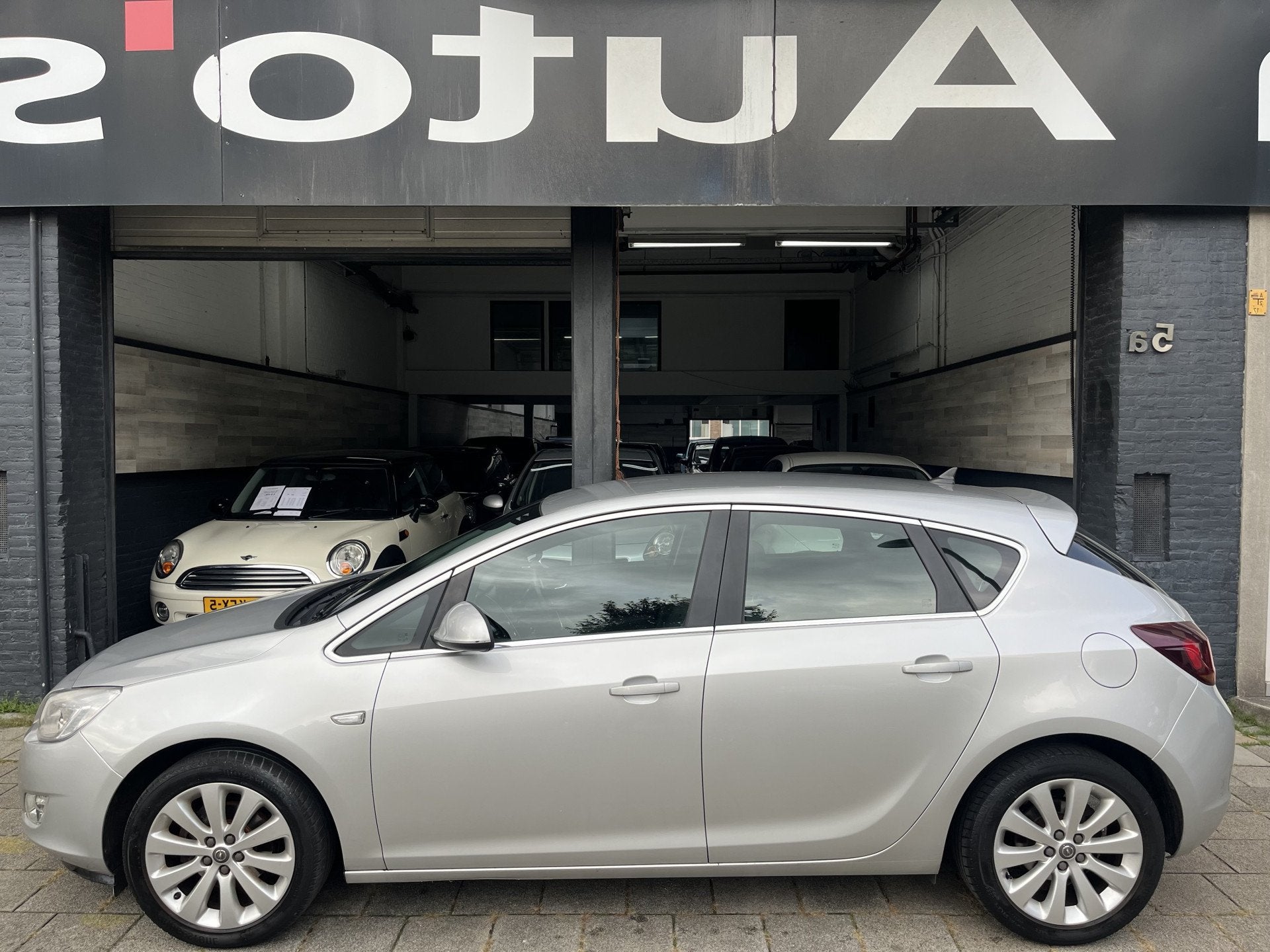 Opel Astra 1.4 Turbo Cosmo (bj 2011), Auto's, Voorwielaandrijving, Euro 5, Gebruikt, 4 cilinders