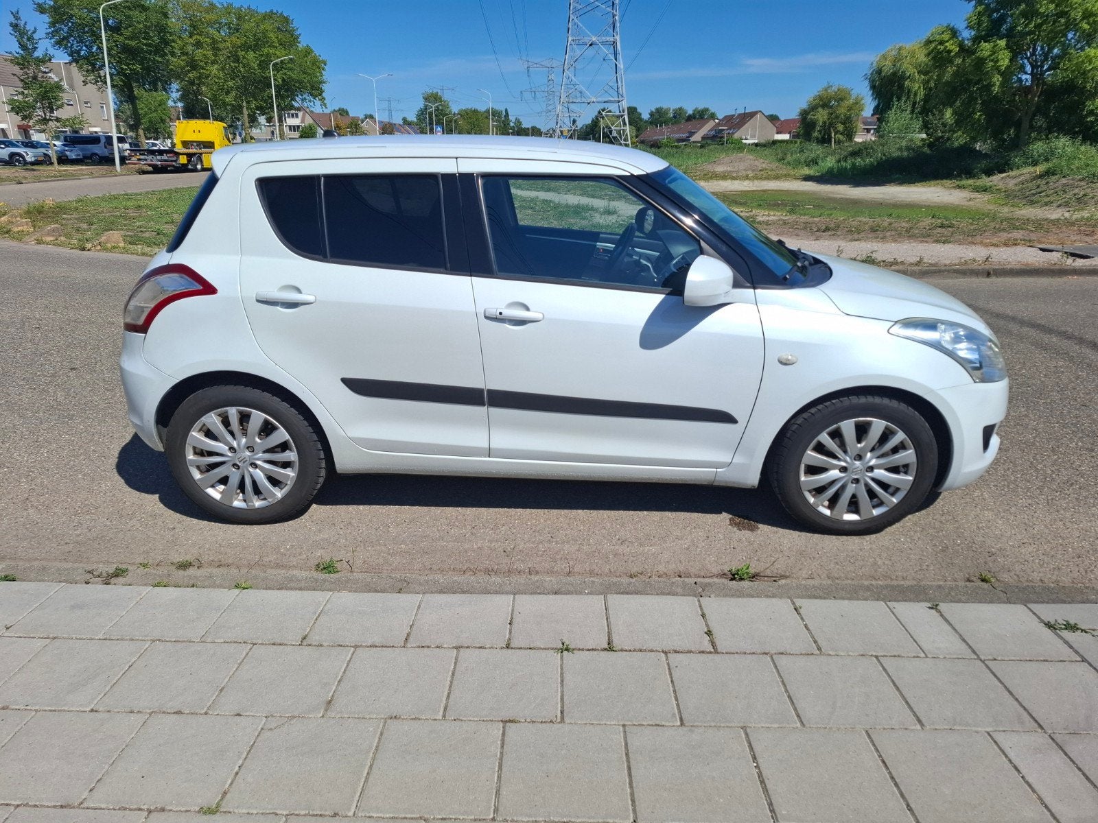 Suzuki Swift 1.2 5-D 2011 Wit, Voorwielaandrijving, 4 cilinders, 400 kg, Origineel Nederlands