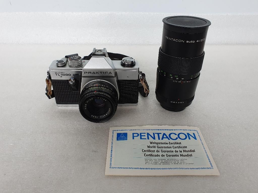 Pentacon Praktica Super TL 1000 + 2 lenzen, Ophalen of Verzenden, Gebruikt, Spiegelreflex, Overige Merken
