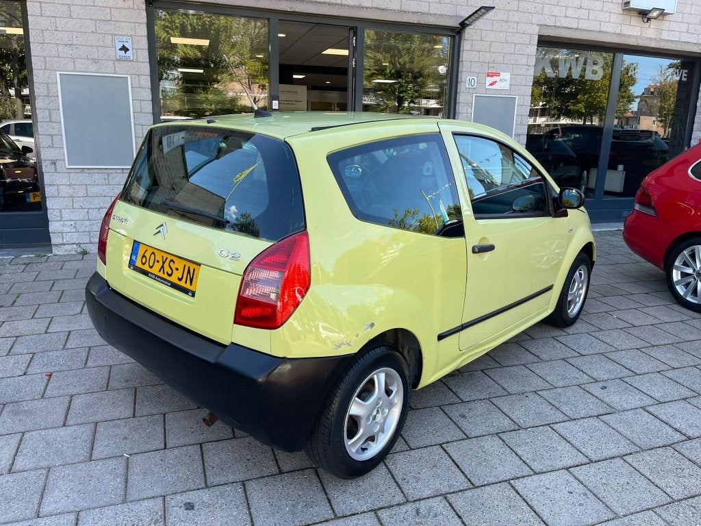 Citroën C2 1.1i Séduction Nieuwe apk Weinig KM (bj 2004), Voorwielaandrijving, 450 kg, 4 cilinders, Geel