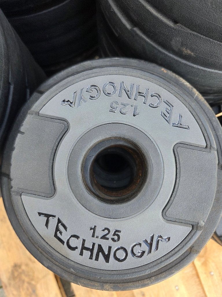 Technogym PU Urethane halterschijven - diverse gewichten, Sport en Fitness, Ophalen, Gebruikt, Benen, Halterschijven