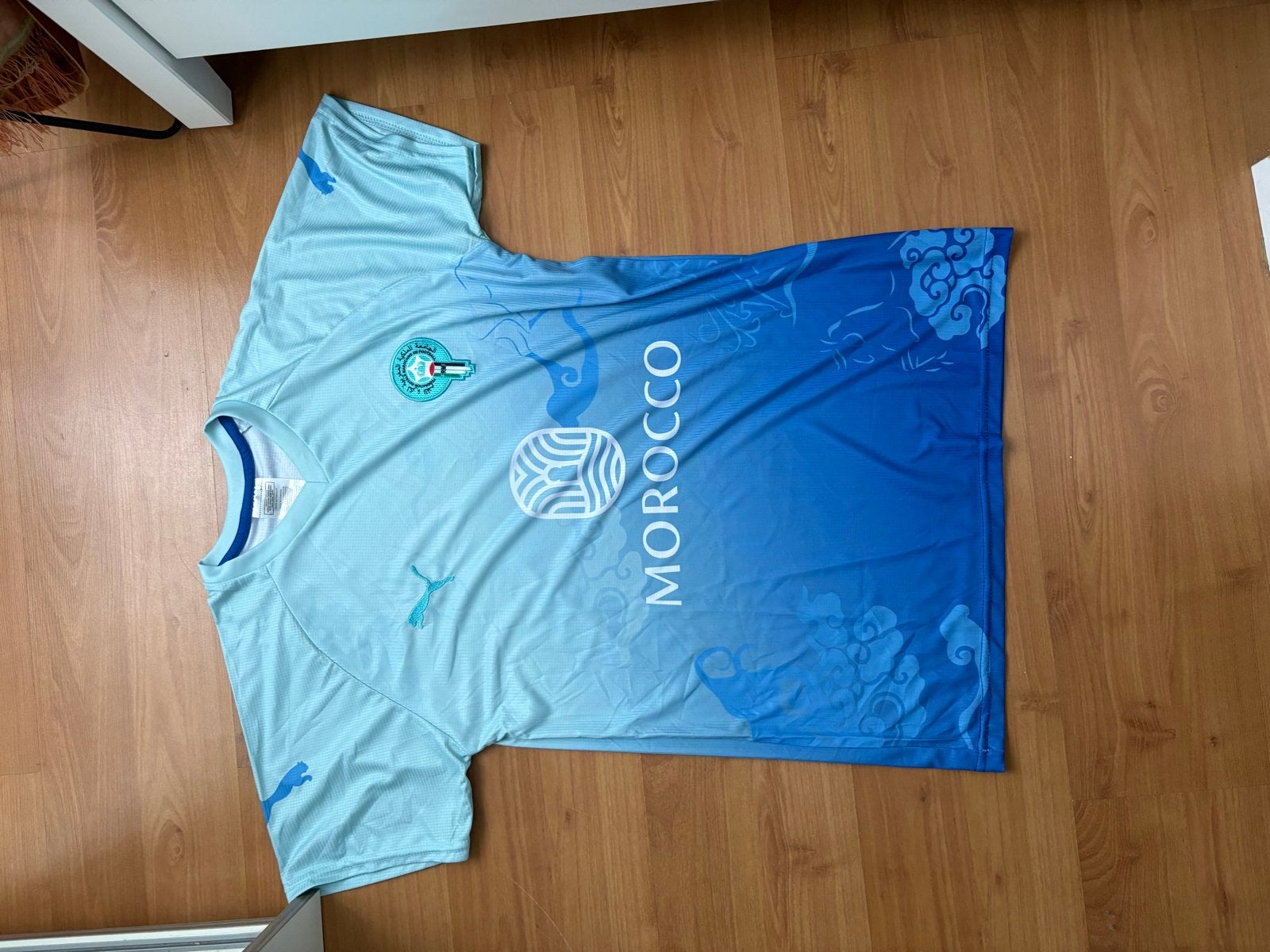 Puma Marokko Voetbalshirt - Lichtblauw/Blauw - Maat l, Kleding | Heren, Maat 52/54 (L), Blauw, Nieuw, Ophalen of Verzenden