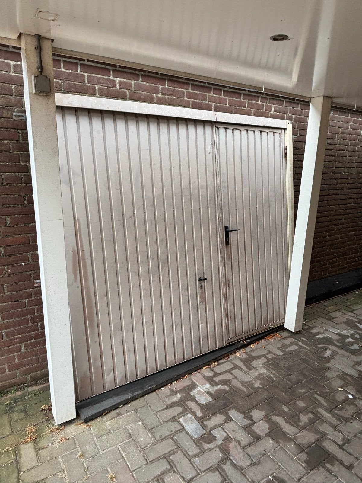 Garagedeur met loopdeur, Doe-het-zelf en Verbouw, Ophalen
