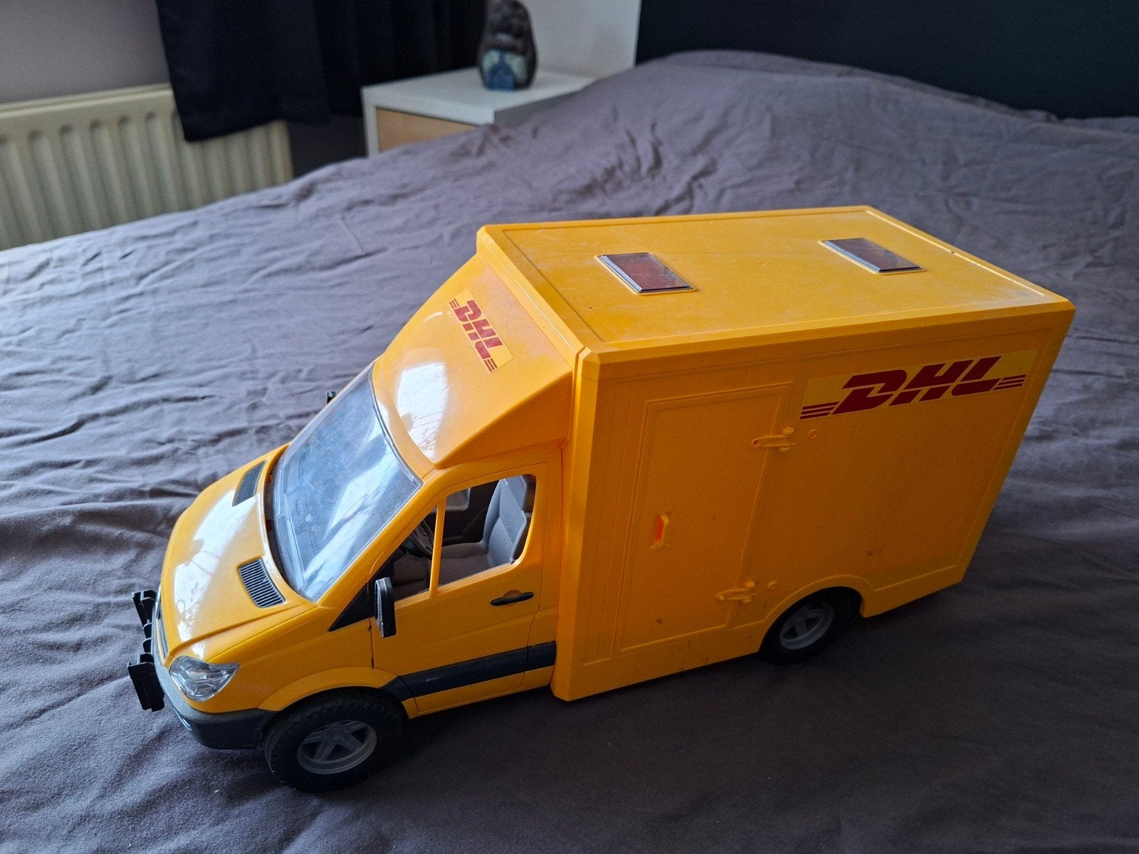 DHL bus, Ophalen, Bus of Vrachtwagen