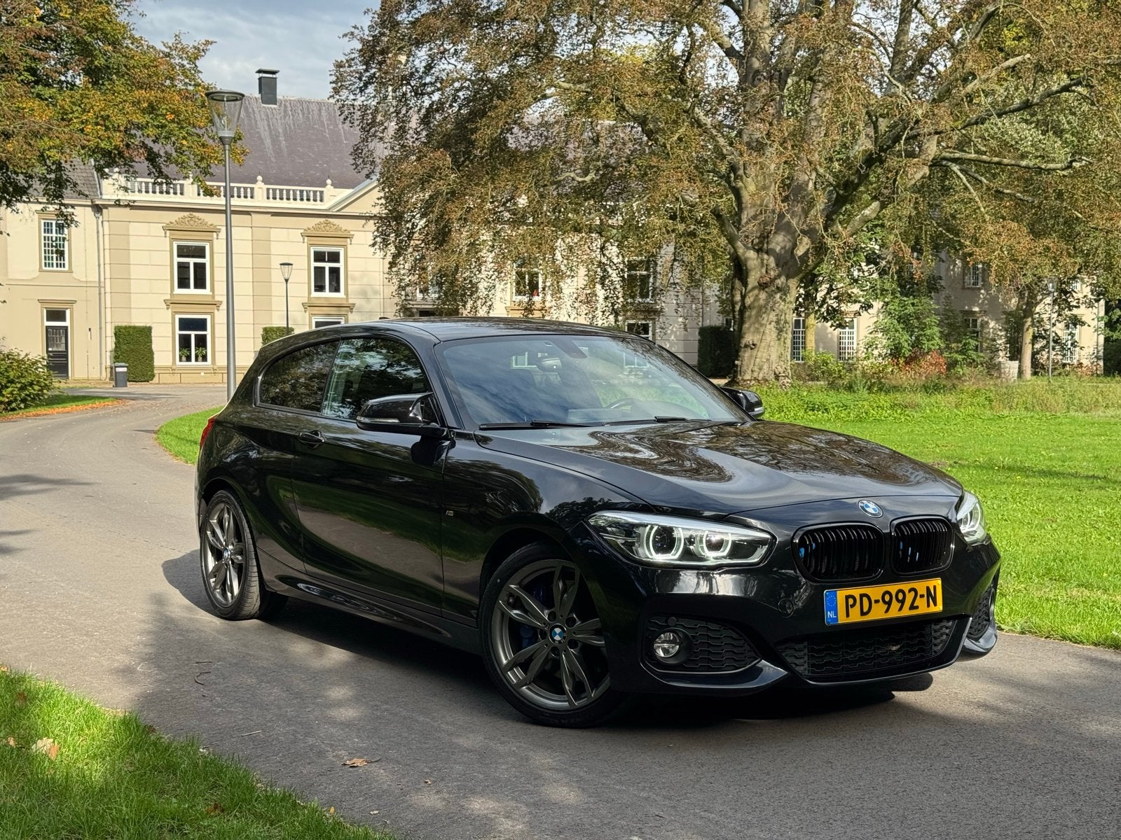 BMW 1-Serie 125i B48 224pk Aut 2017 Zwart, Auto's, 1998 cc, Achterwielaandrijving, Zwart, Particulier