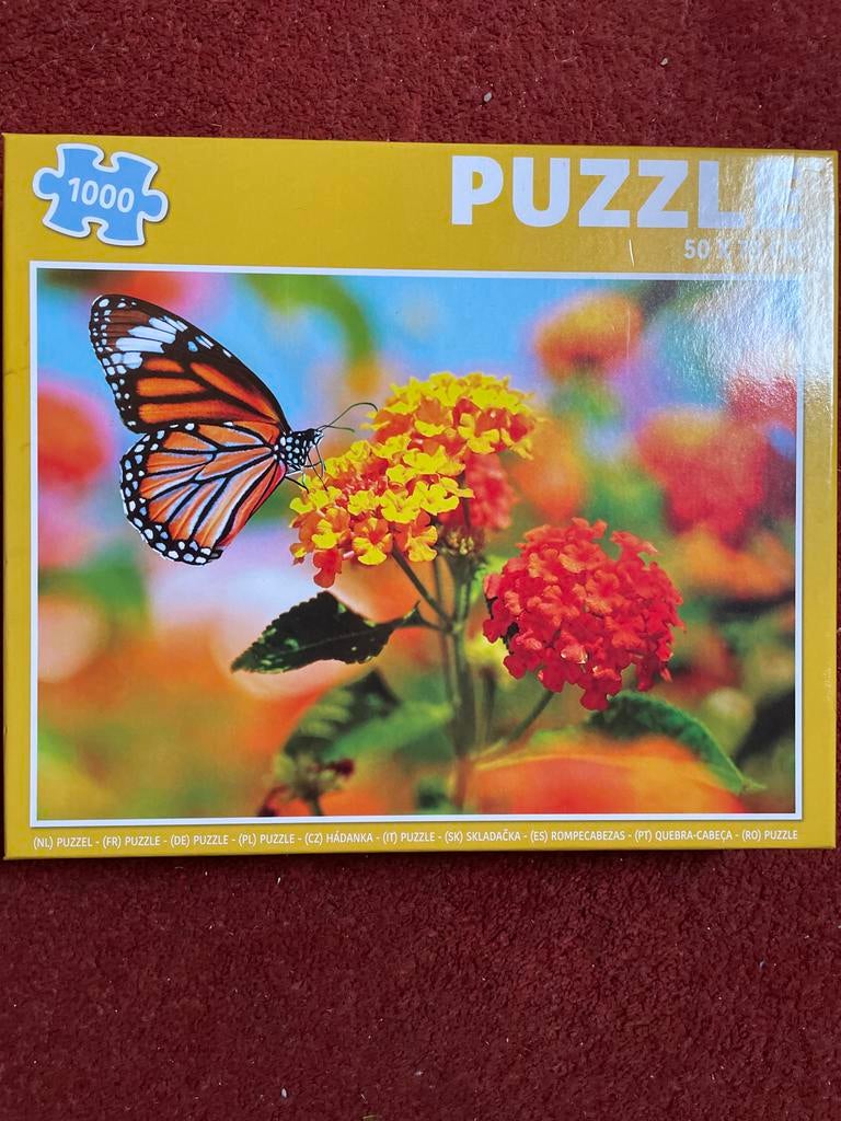 Puzzel 1000 stukjes vlinder en bloemen, Ophalen of Verzenden, 500 t/m 1500 stukjes, Zo goed als nieuw, Legpuzzel
